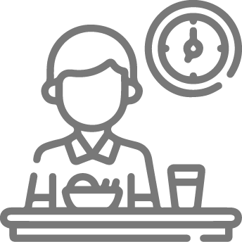 Gray icon of a person dining at a table with a clock in the background, representing meal times or dining schedules.